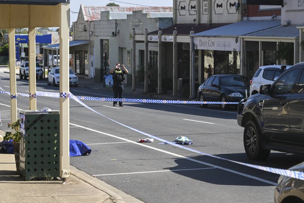 Main Street, Rutherglen, is blocked off on Thursday, March 28, as police officers investigate the now-fatal incident. Picture by Mark Jesser