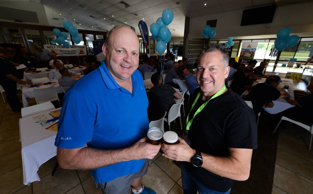 SHARING THEIR STORIES: Media personality Billy Brownless and Albury's Mark Hore catch up at Clubhouse Bar & Bistro. Picture: MARK JESSER
