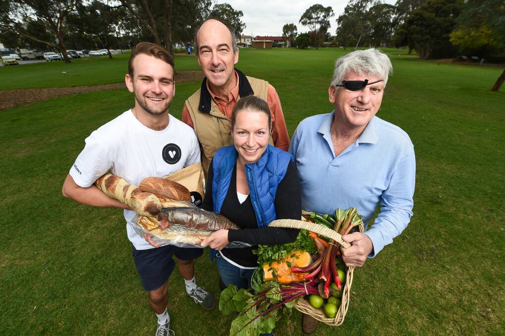 SETTLING IN: Albury Wodonga Farmers Market co-ordinator Pia Frei with Joe Perry, of Valentines Artisan Sourdough Bakers, Anthony Ainsworth, of Butt's Gourmet Smokehouse, and Byron Gray, of Willowbank. Picture: MARK JESSER