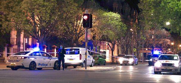 INCIDENT: Police set up a crime scene in Dean Street, Albury, on Saturday evening. Picture: SHANON GYOLES