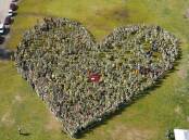 FLASHBACK: On August 29, 2010, about 1400 people form the shape of a heart at an Albury-Wodonga rally to push for a cancer centre. Better Border Health hopes Sunday's rally will help unite the community behind another health cause, a new hospital.