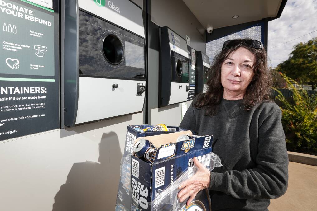 NOT THIS TIME: Jan Imlach, of North Albury, is one of many who found the reverse vending machine at Norris Park IGA wasn't working on Thursday. Picture: JAMES WILTSHIRE