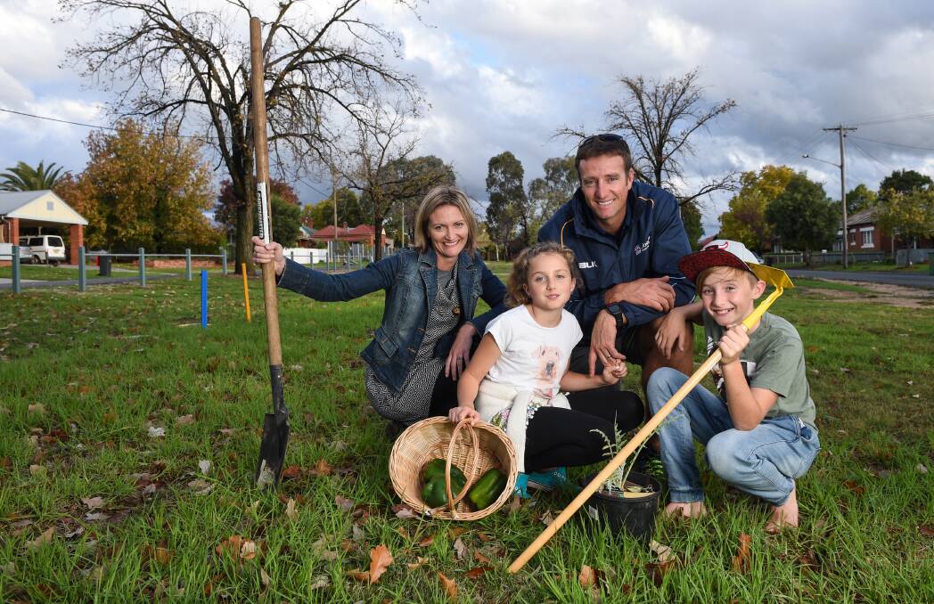 MAKING A START: Nadia Dosenko-West and her family, husband Aaron and children Isabelle and Elijah are ready for Sunday's East Albury community garden event.