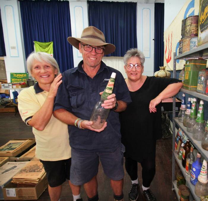 MEMORIES:Siblings Robyn Moore, of Corowa, Berrigan's Stuart Lee and Albury's Elizabeth Browne with some of their parents' collection. Picture: MATTHEW SMITHWICK