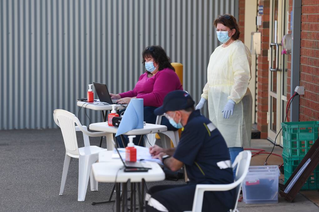 MOBILE CLINIC: Nurses prepare for community coronavirus testing at Henty on Friday. Picture: MARK JESSER 
