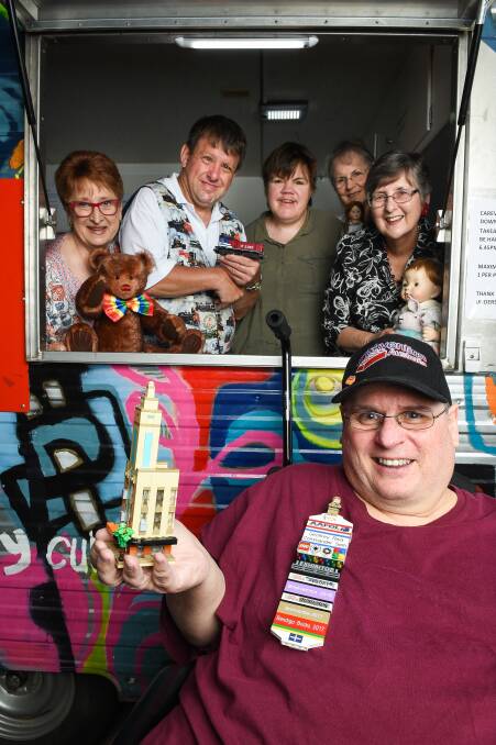 SHARING INTERESTS: Geoffrey Reid (front), Ruth Jack, Darryn Coulston, Kylie Gould, Chris Jones and Margaret Grigsby all care about Carevan. Picture: MARK JESSER