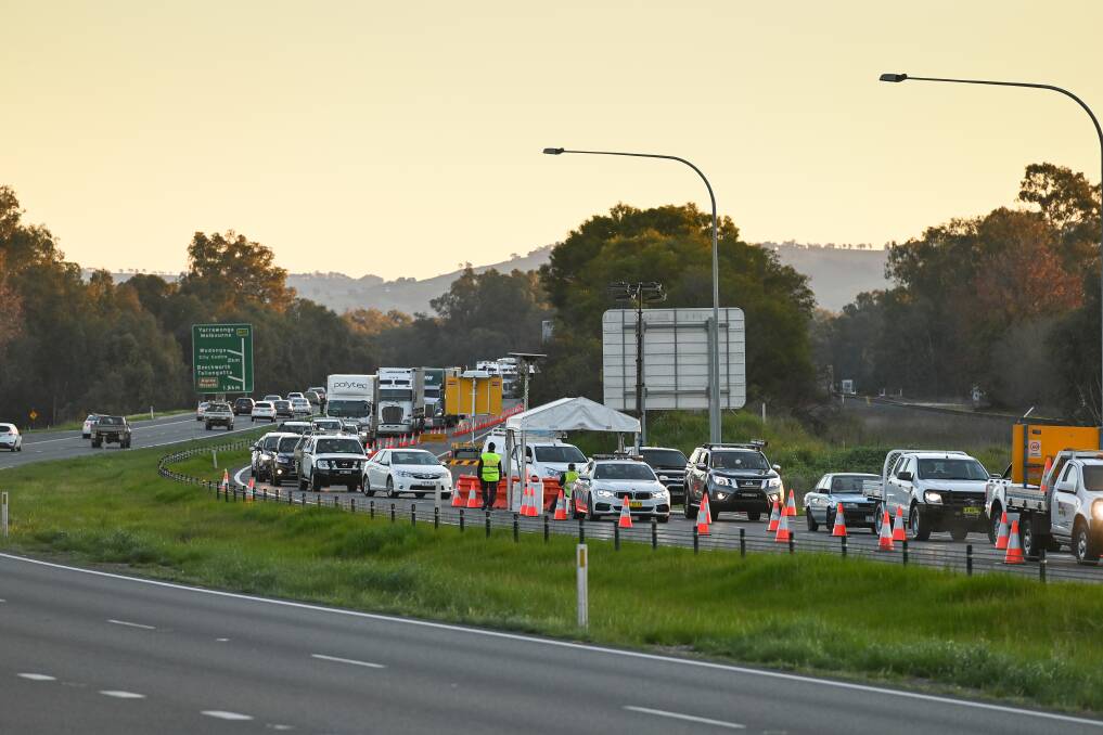 DAILY GRIND: Traffic makes its way through the border checkpoints. Picture: MARK JESSER