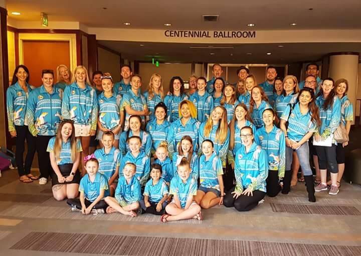 GO AUSSIES: The Australian team, including Andrina Dixen (kneeling centre, dark hair), are ready to take on all comers at the 2018 World Championships of Performing Arts.
