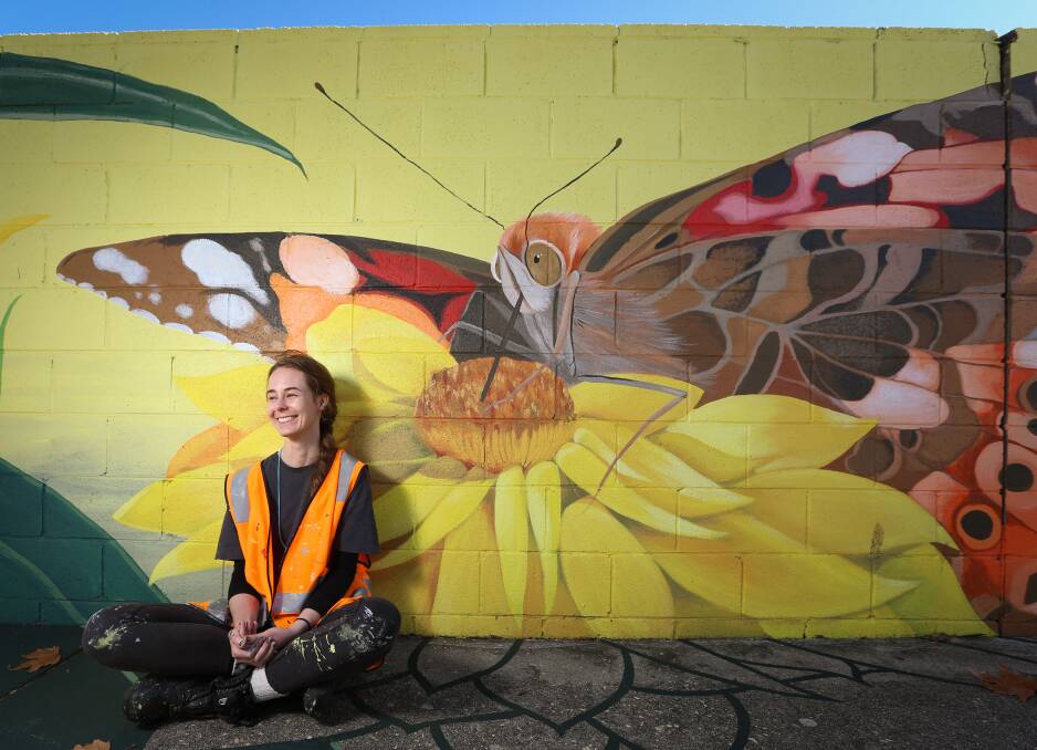 CITY OASIS: Artist Kristina Greenwood is transforming a 100 sq m Albury wall with the second of two themed murals featuring fauna from the region. Picture: JAMES WILTSHIRE