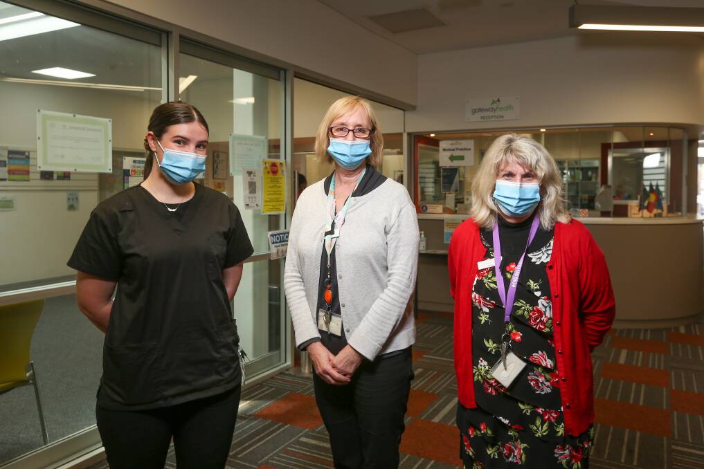READY TO ASSIST: Gateway Health Wodonga reception staff Pip Scammell, Janice Moreland and Chris Beckton work closely with the doctors and nurses. Picture: JAMES WILTSHIRE