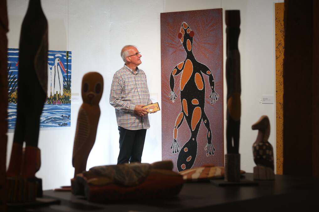ARTISTIC PASSION: Aboriginal Exhibitions Gallery director Hans Sip considers Gecko by Luke Cummins at Rutherglen Estates. Picture: KYLIE ESLER