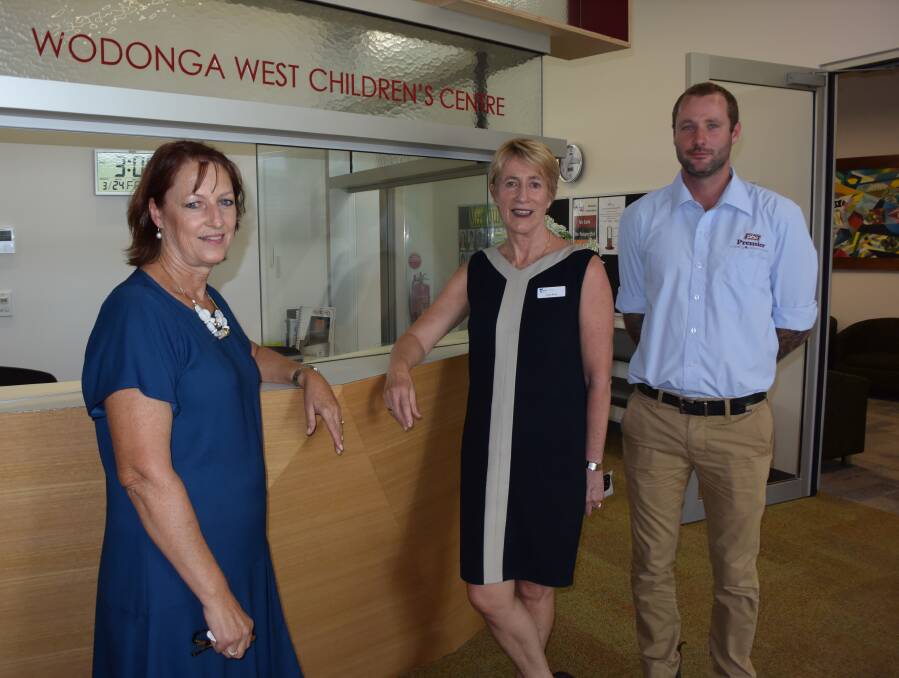 MISSION ACCOMPLISHED: Principal Jocelyn Owen, North Eastern Victoria regional director Judy Rose and Premier Building and Construction site manager Ash Cooper look over the newly finished Wodonga West Children's Centre.