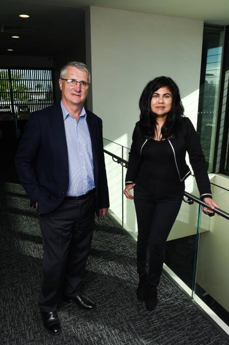 CREATING CONNECTIONS: Advanced Manufacturing Growth Centre state director Michael Grogan and materials science Professor Veena Sahajwalla aim to link Border businesses with global opportunities. Picture: MARK JESSER