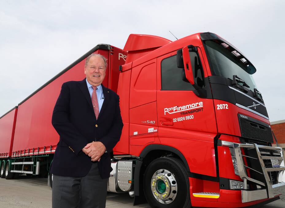 MILESTONE DELIVERY: Company founder Ron Finemore receives Ron Finemore Transport's 300th prime mover from CMV Truck and Bus in Wagga. Picture: EMMA HILLIER