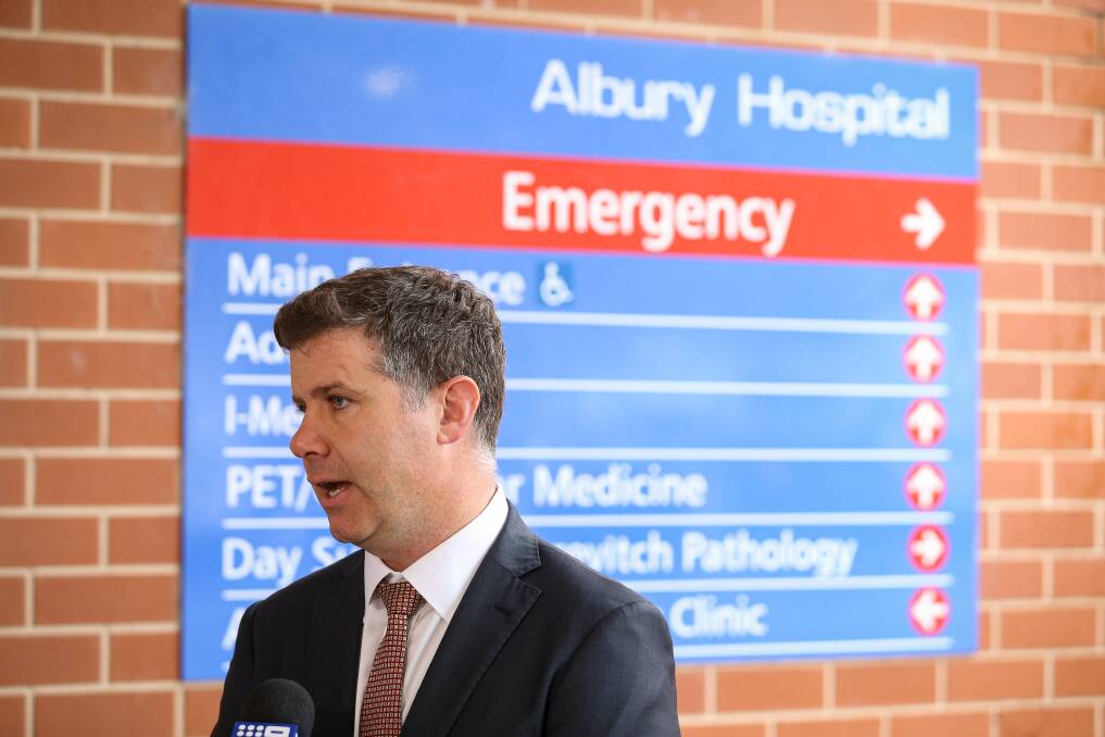 CONCERNS: Albury MP Justin Clancy speaks to the media outside Albury hospital last year. A reader says Border health facilities are not fit for purpose. Picture: JAMES WILTSHIRE
