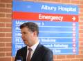 CONCERNS: Albury MP Justin Clancy speaks to the media outside Albury hospital last year. A reader says Border health facilities are not fit for purpose. Picture: JAMES WILTSHIRE