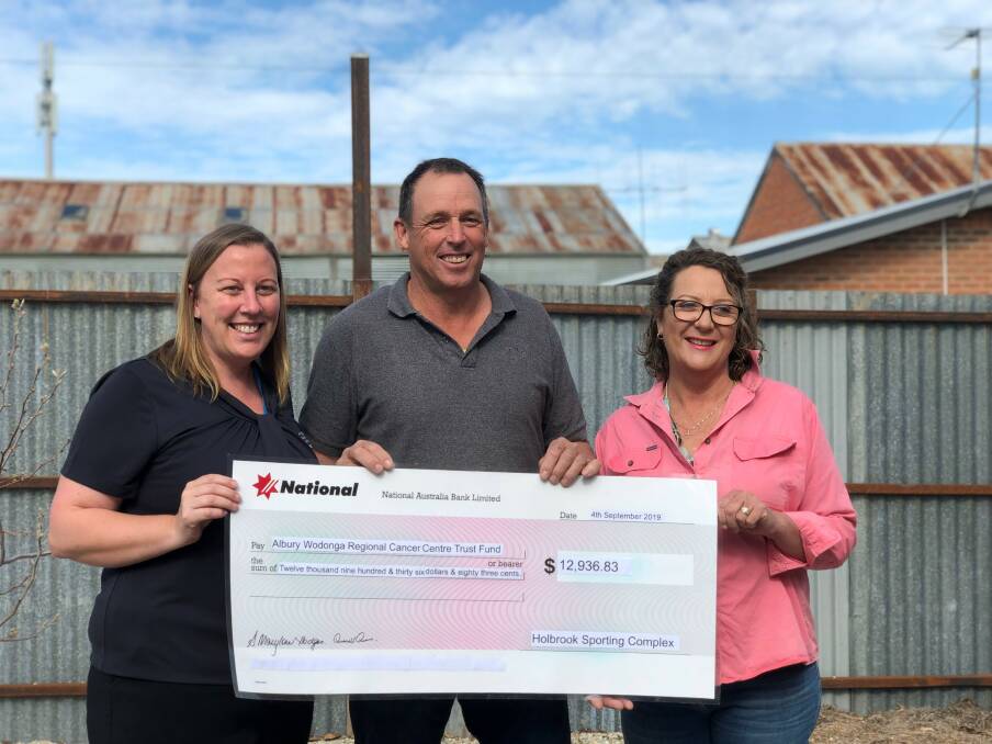 PRESENTATION: Albury Wodonga Regional Cancer Centre Trust's Kristie McMahon, Russell Parker, of Holbrook District Fundraisers and Kerry Morton of Rotary Club of Holbrook.