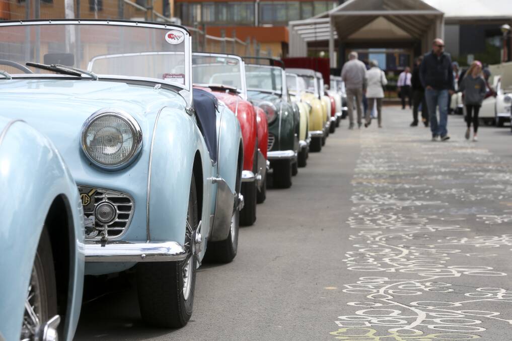 Passers-by stopped for a second look at the Triumph sports cars on show at Albury's QEII square. Pictures: ELENOR TEDENBORG