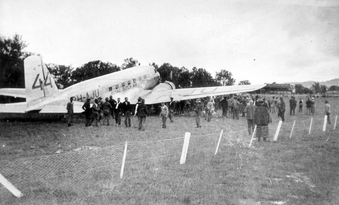 TALKING POINT: Albury people check out the Uiver after its unexpected but successful landing on the racecourse in October 1934.