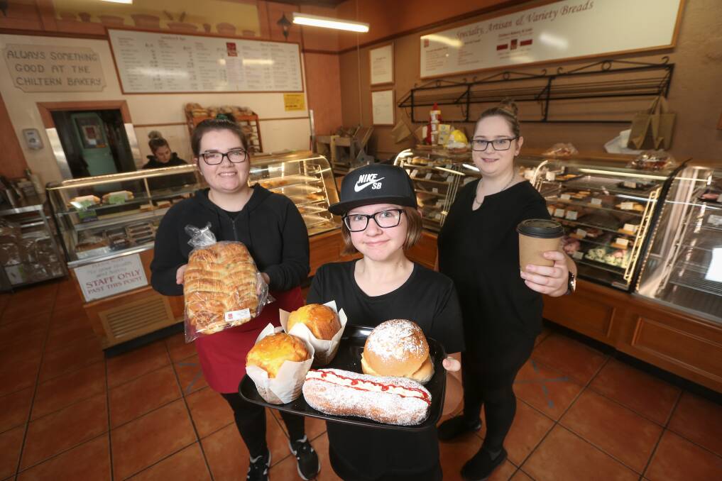 SMALL STEPS: Chiltern Bakery and Cafe's Grace Manson, Amy Ziebarth, 14, and Madison Williams are preparing to welcome back dine-in customers next week. Picture: JAMES WILTSHIRE