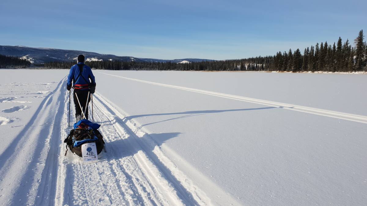 ULTIMATE CHALLENGE: Wooragee's Scott Thomson walks up to 20 hours a day during the Yukon Arctic Ultra in northern Canada. Picture: KATRINA PAWLEY