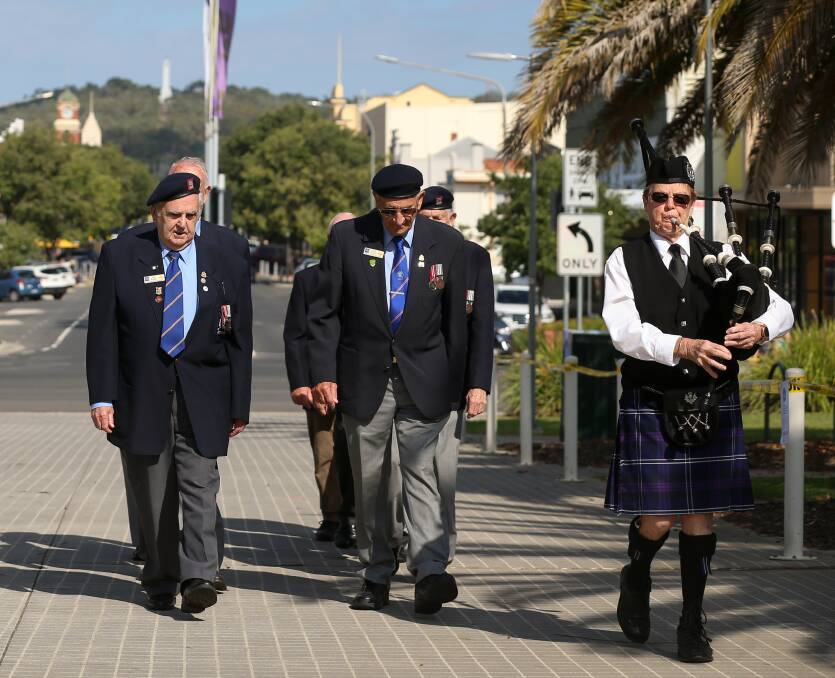 SOLEMN MARCH: Murray Border Nashos members walk towards the memorial garden as part of National Servicemen's Day commemorations in Albury last year. Picture: JAMES WILTSHIRE