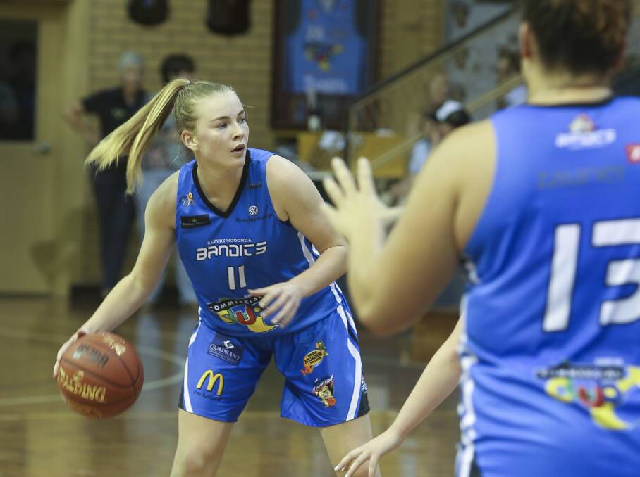 GOOD EXPERIENCE: Steph looks for options while playing for the Lady Bandits in the game against Nunawading at Lauren Jackson Sports Centre in April.