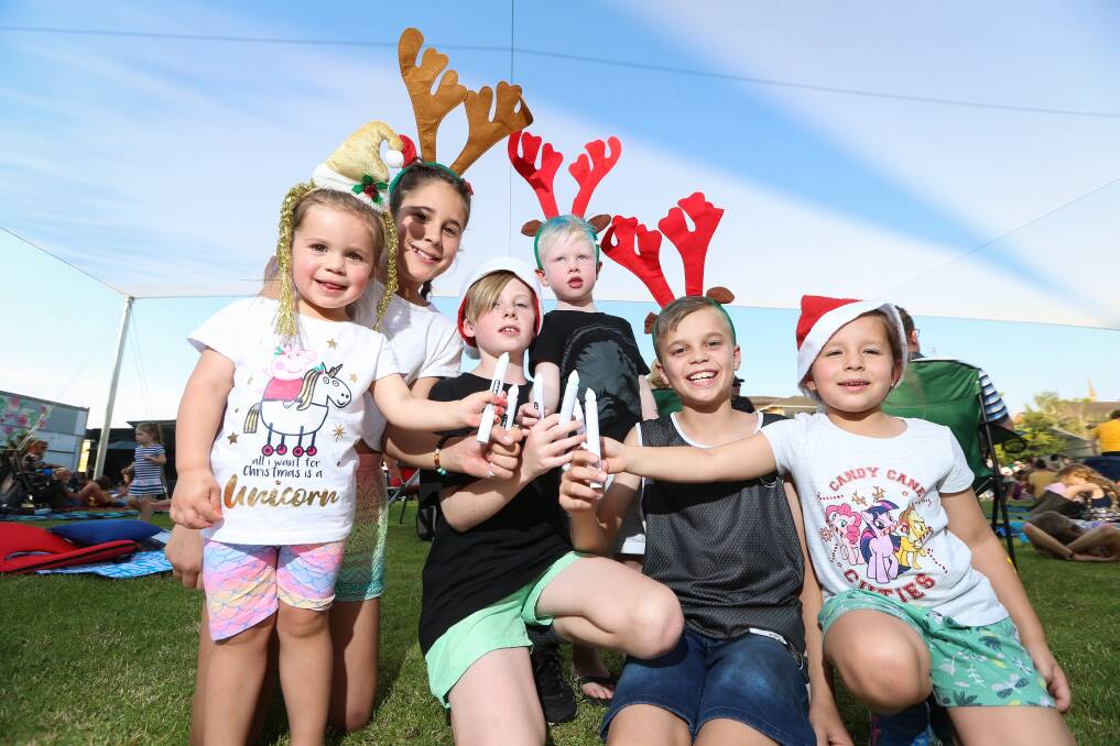 COLLECTION OF COUSINS: Ready with their candles are Wodonga's Layla Ruby, 2, Tahlia Ruby, 12, Bohdi Page, 12, Braxton Page, 4, Declan Ruby, 10, and Savannah Ruby, 6. Picture: JAMES WILTSHIRE