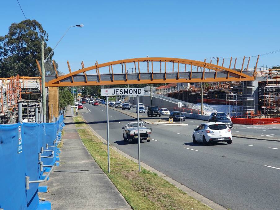 BRIDGING THE GAP: After being trucked out of Wodonga last week, the shared cyclist/pedestrian bridge is now installed in Newcastle.