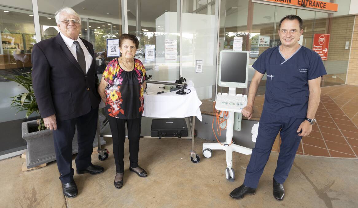 WELCOME UPGRADE: Murray Valley Centre chief executive David Martin and president Barbara Prenter with Albury Wodonga Health urologist Jonathan Lewin and the existing equipment to be replaced. Picture: ASH SMITH