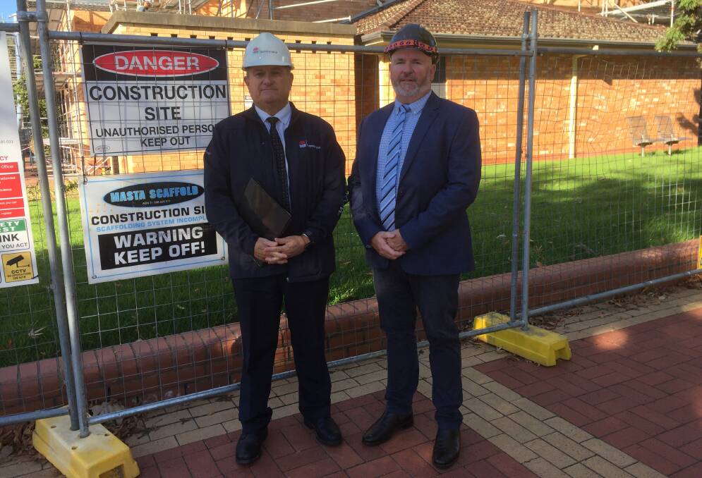 CONSTRUCTION CARE: SafeWork NSW director regional construction Laurence Richey and Master Builders Association NSW executive officer - safety David Solomon encourage safety on building sites.