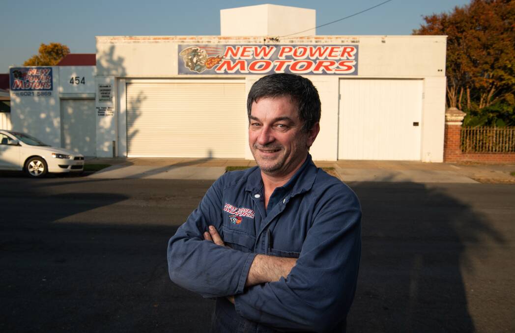 DOORS SHUT: Peter Allen closes New Power Motors for good. The Albury mechanic has been in Macauley Street for 32 years as employee and boss. Picture: MARK JESSER