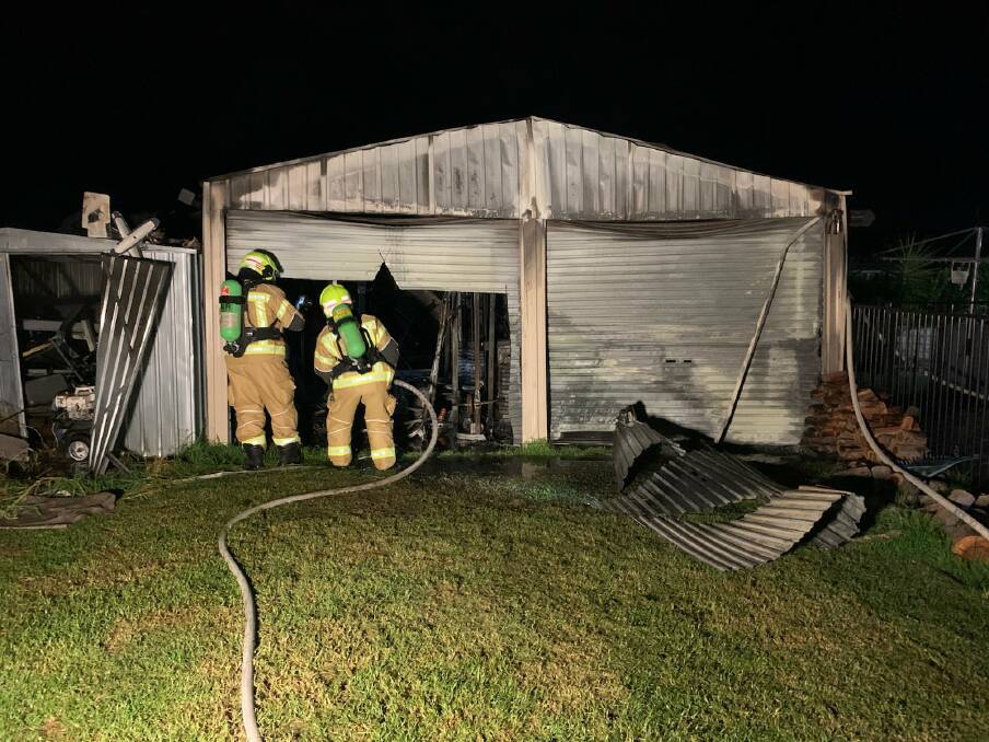 CONTAINMENT: Firefighters stopped the fire from spreading beyond the shed where it started. Picture: FIRE AND RESCUE NSW