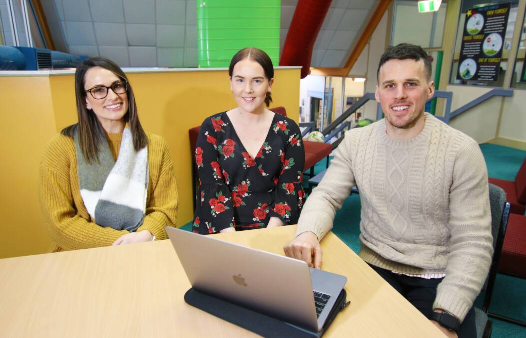 Melrose Primary School teachers Kelsie Goodwin, Stephanie Kovacs and Josh Thorp join hundreds of staff during Friday's conference. Picture: NICHOLAS QUIHAMPTON