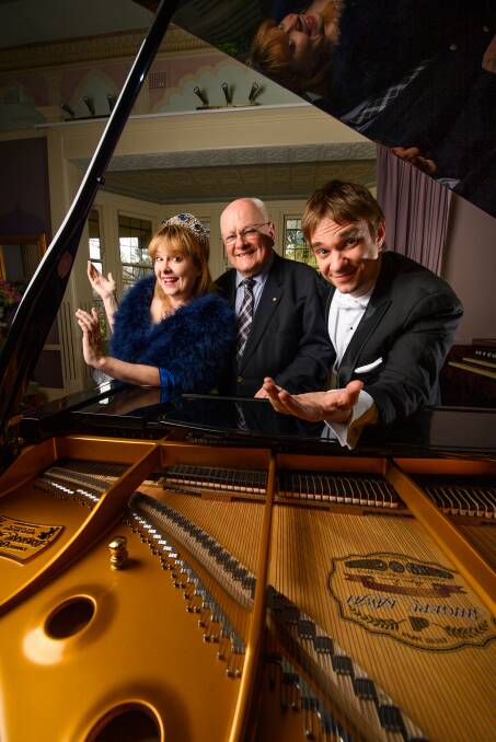 MERRY MUSICIANS: Sally-Anne Russell, John Bolton Wood and Mario Dobernig prepare for the Albury Chamber Music Festival's Border launch earlier this month. Picture: MARK JESSER