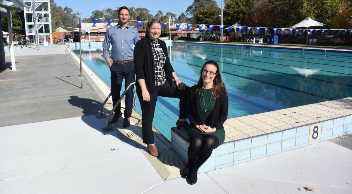 POOLING RESOURCES: Aligned Leisure chief executive Shane Dunne, Wodonga Council sport and recreation manager Jenelle Williamson and Albury deputy mayor Amanda Cohn meet up at Albury Swim Centre on Wednesday.