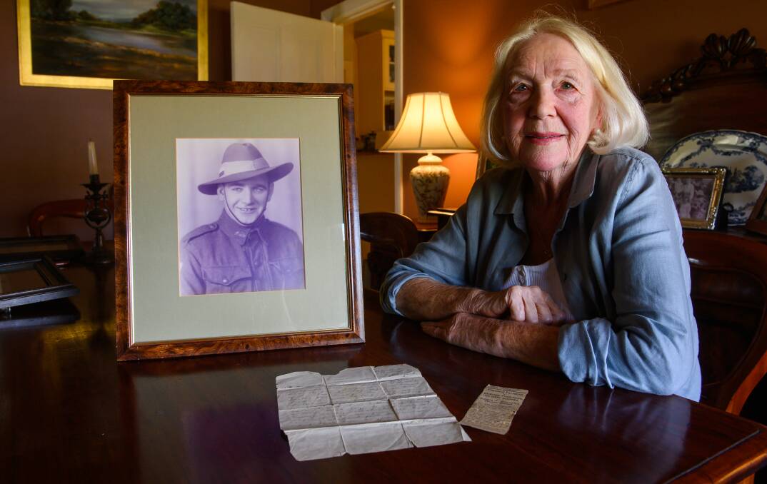 FAMILY HISTORY: Marilyn Forrest, of Albury, feels proud of the wartime bravery demonstrated by Stanley 'Jack' Quinn, her mother's cousin. Pictures: MARK JESSER
