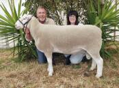 Detpa Grove's David and Michelle Pipkorn with the top priced ram, lot 92, DG220811 TR, which sold for $12,500 to Shane and Jodie Foster, Boonaroo, Casterton, Victoria. Picture supplied