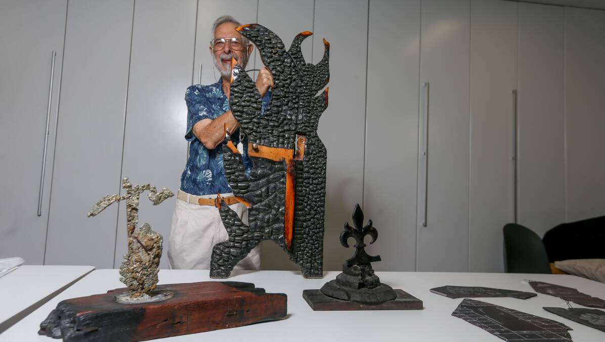 OUT OF FIRE GROUND: Kersi Rustomji displays his artwork, made from bits and pieces he picked up after St Matthew's Church was destroyed by fire 29 years ago. The church was rebuilt in 1994. Picture: TARA TREWHELLA