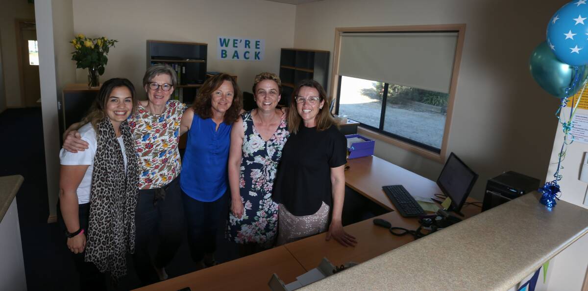 NEW SPACE: The LEAP Centre's Teagan Gay, Sarah Nicolson, Judith Sowden, Meaghan Lewin and Michelle Smits are happy to be back in their refurbished administration area, which was badly damaged in April. Picture: TARA TREWHELLA 