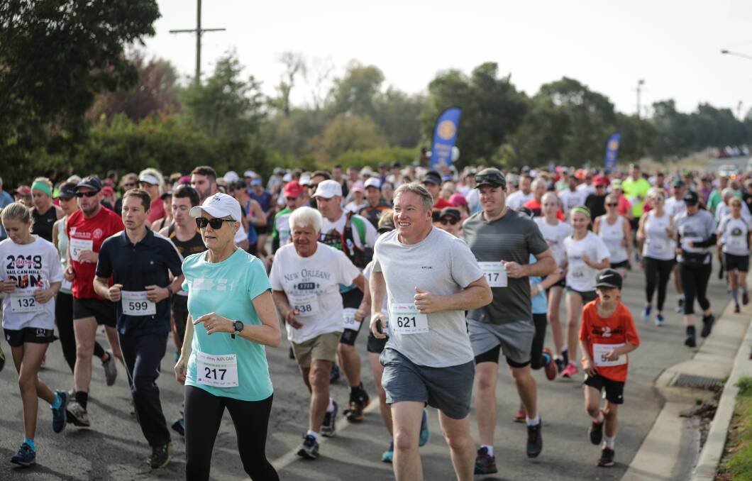 FLAT OUT: The opening section of the Nail Can Hill Run in Lavington belies the gruelling hills to come over the 11.3 kilometre trek to Boonie Doon Park in West Albury. The runners look comfortable so far. Picture: JAMES WILTSHIRE