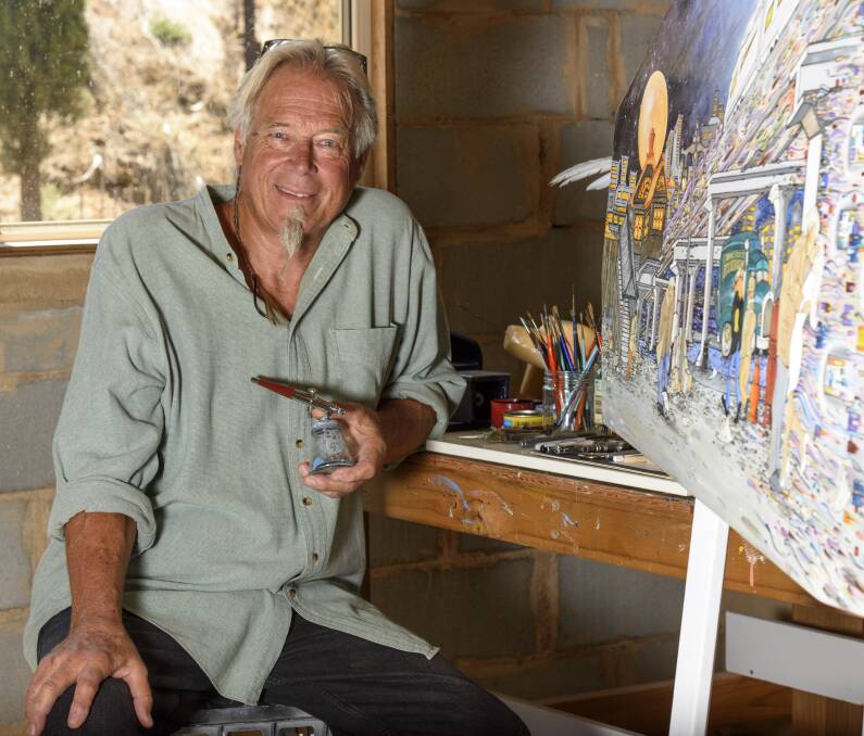 AT HOME: H.Fish plans his new show. He tells American friends Beechworth is "not quite as snowy, but it's Australia's Aspen, Colorado. It's a tourist town, it's old, it's preserved, it's high and it's very artistic." Picture: SIMON BAYLISS