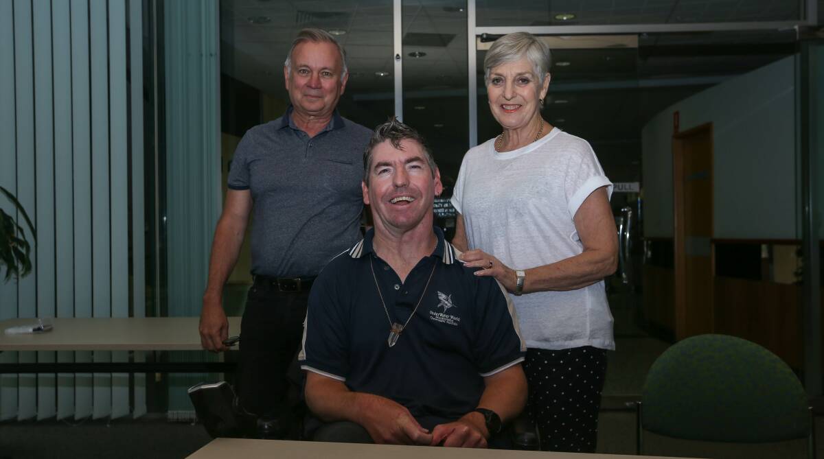 SHARING KNOWLEDGE: Specialist Disability Accommodation consultant Greg Barry meets with NDIS participant Curt Gouma and his mother Jan at Albury Council chambers. Picture: TARA TREWHELLA