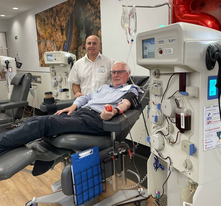 CAUSE FOR CELEBRATION: Albury Blood Donor Centre manager Sergio De Marchi with Neville Bartlett as he makes his 500th donation on Wednesday.