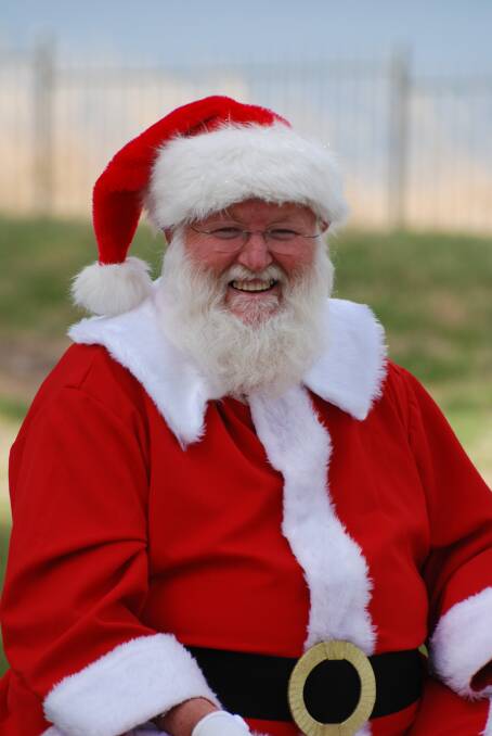 IN DEMAND: Mike Bodman, of Wodonga, wore his Santa suit with pride