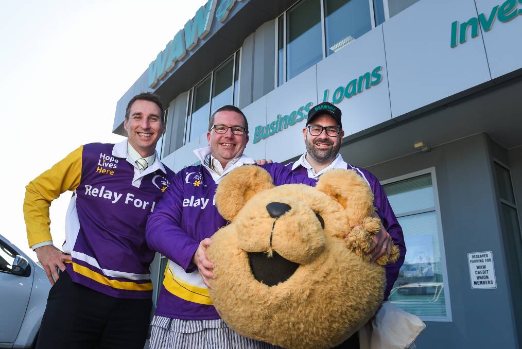 TEAMING UP: WAW Credit Union chief executive Michael Mack, fraud and payments manager Stan Vyce and sales and distribution strategy manager Paul Vaccaro are ready to relay. Picture: MARK JESSER