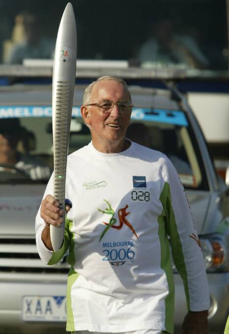 PROUD MOMENT: Les O'Brien runs across Lincoln Causeway during the Commonwealth Games Queen's baton relay in February 2006.