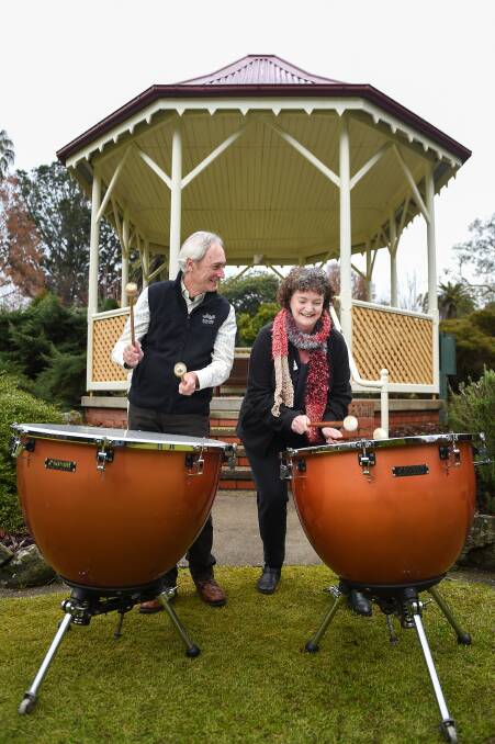 TIMPANI TALK: Border Music Camp's Peter Cerexhe and Rotary Club of Albury's Charlene Gleeson test the instruments. Picture: MARK JESSER