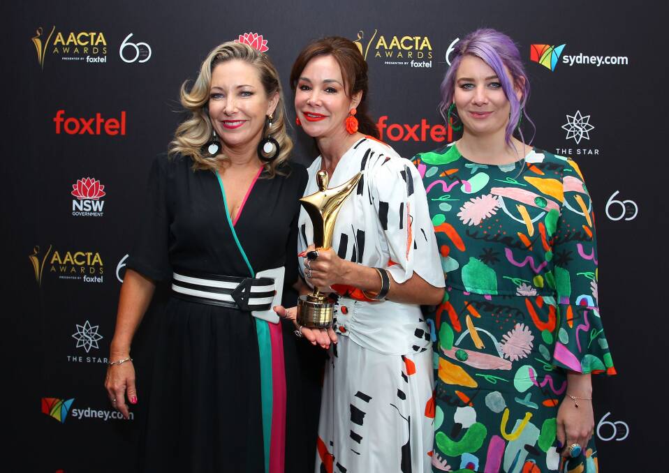 TOP OF THEIR TRADE: Beth Halsted (right), Anna Gray and Jen Lamphee celebrate their success at the AACTA Awards industry luncheon on Monday. They won the Best Hair and Make-up Award from three other finalists.