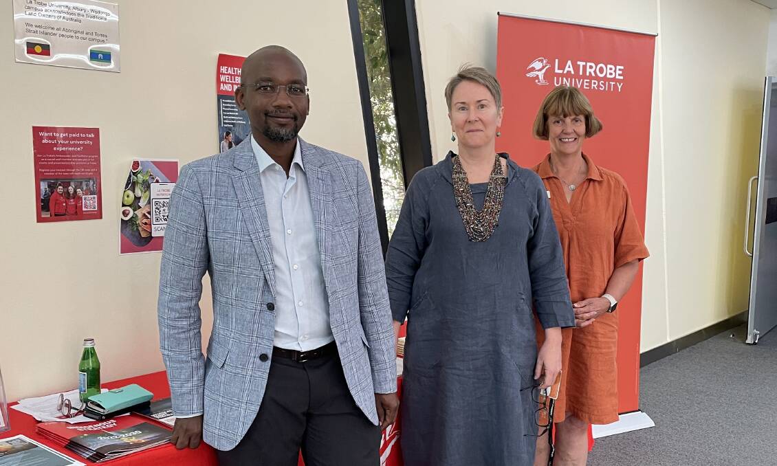 Working together to improve crisis communication to multilingual communities are Albury-Wodonga Ethnic Community Council's Richard Ogetii, La Trobe research fellow Dr Samantha Clune and La Trobe University Albury-Wodonga head of campus Dr Guinever Threlkeld. Picture by Janet Howie